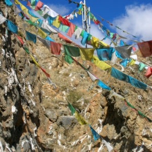 Prayer flags bless these Tibetan mountains.