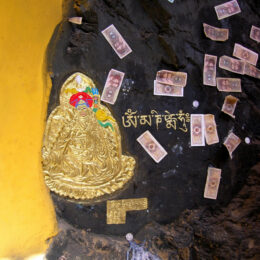 Another corner of Tibet that had a poetic design. This site was found in a cave in Lhasa, Tibet. The yellow wall matched Buddha’s golden skin, and the coins and bills contrasted with the Buddha.