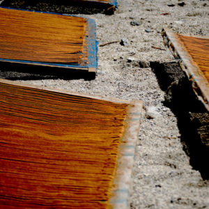 These filters contained wooden residues that were purified in an incense factory. The incense was then laid out in front of a Tibetan home to dry.