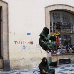 Just a normal day at Prague. Street vendors and artists entertain the masses.